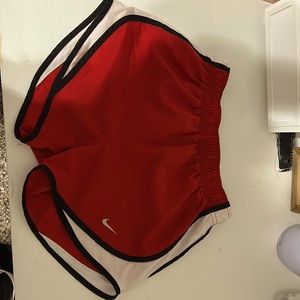 Red nike shorts, size youth large.